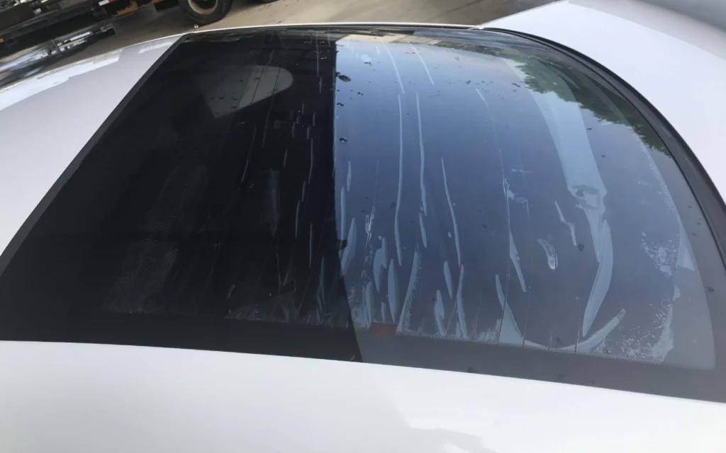 Film Installers Rear Window Tint Bubbling Before Picture